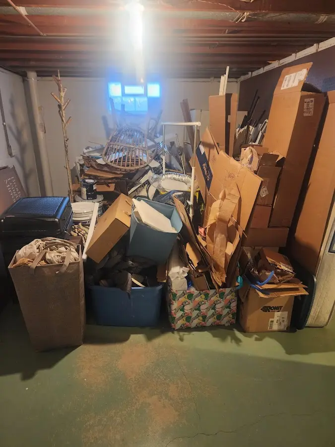 Roll-off dumpster container at job site for 15 Yard Dumpster Rental in Maumelle